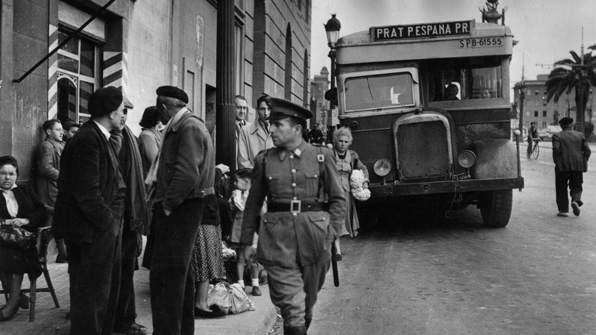 14th April 1951   An armed policeman patrolling the streets of Barcelona during the General Strike in which 300 000 strikers across Catalonia protested against corruption in Franco s dictatorship  Original Publication  Picture Post 5243 - Barcelona  City in Ferment - pub 1951  huelga vaga tramvies tramvia tranvia tranvias (Photo by Bert Hardy Picture Post Hulton Archive Getty Images)