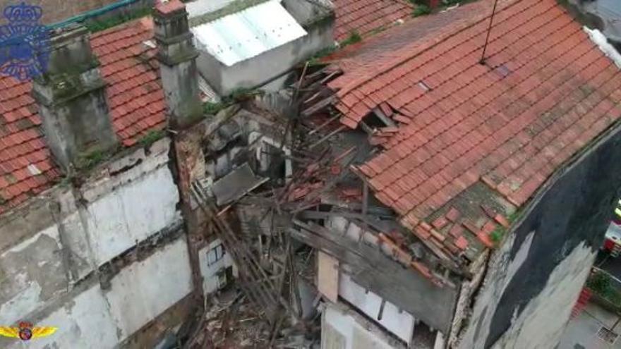 Vista desde el dron de la Policía Nacional del edificio derrumbado en la calle Areal. 11 febrero 2021