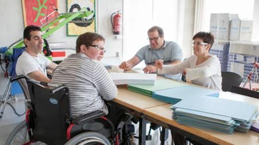 Treballadors d&#039;un centre especial de l&#039;associació Mifas a les comarques de Girona.