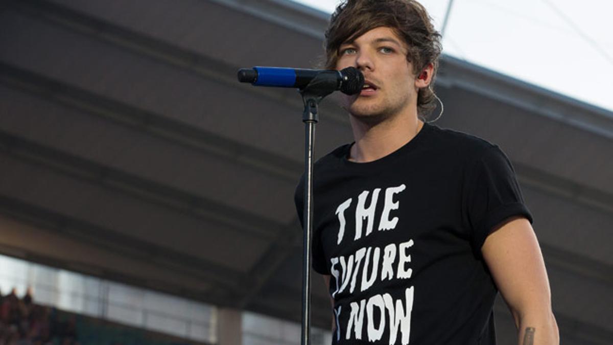 Louis Tomlinson, durante una actuación con One Direction