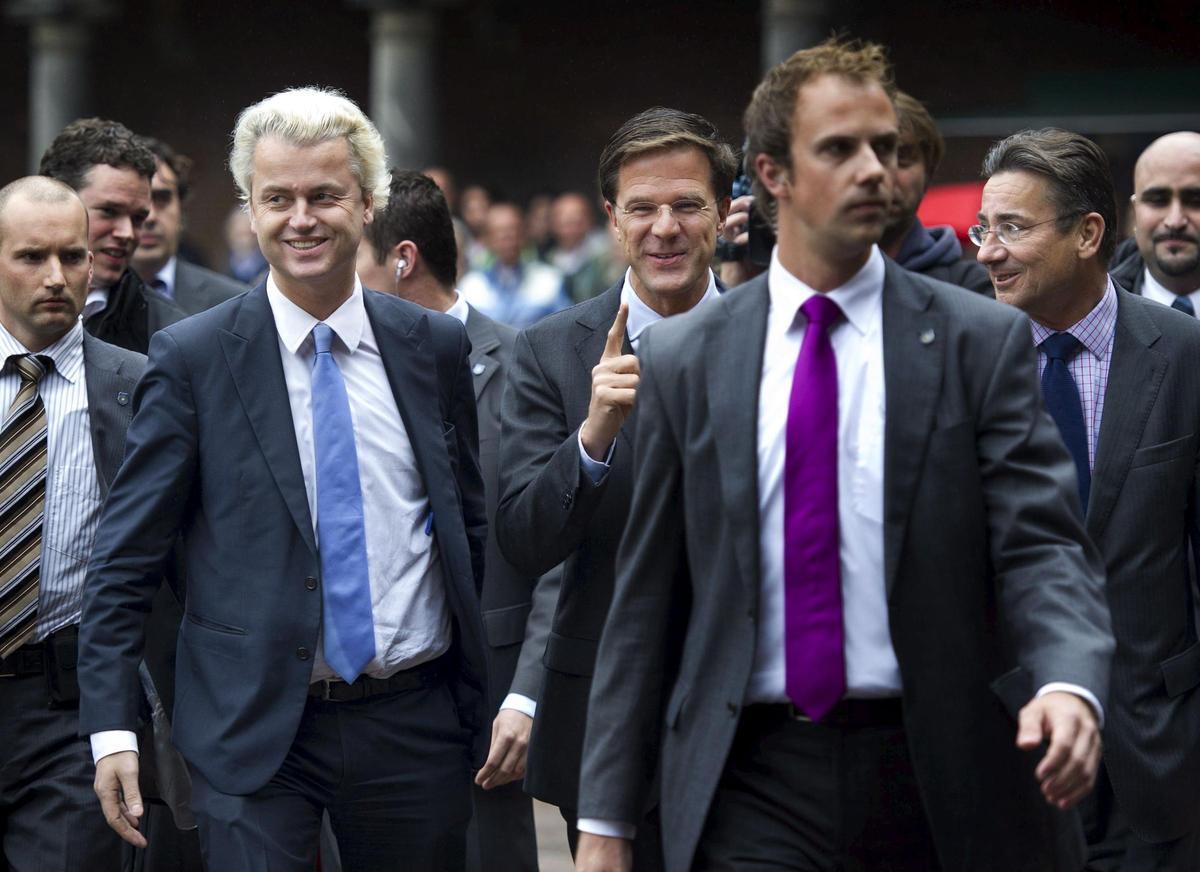 El ultra Geert Wilders y el liberal Mark Rutte, en septiembre de 2010, antes de pactar su coalición de gobierno.