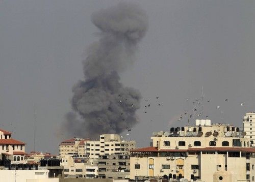 Smoke rises after an Israeli air strike in Gaza City