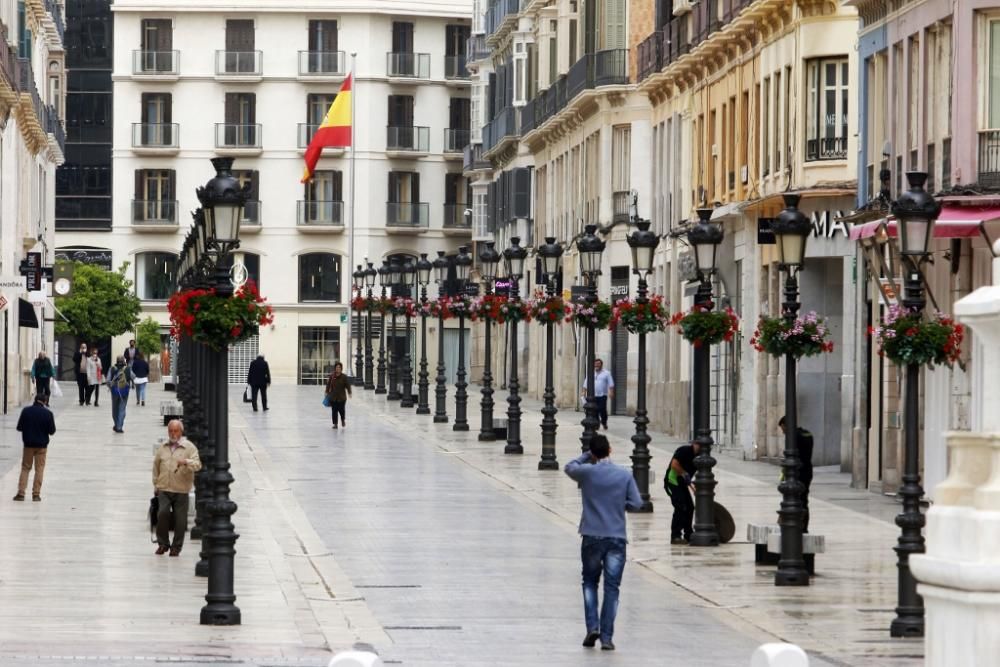 Calles vacías e inhóspitas en lo que era un Centro de Málaga bullicioso y lleno de actividad.