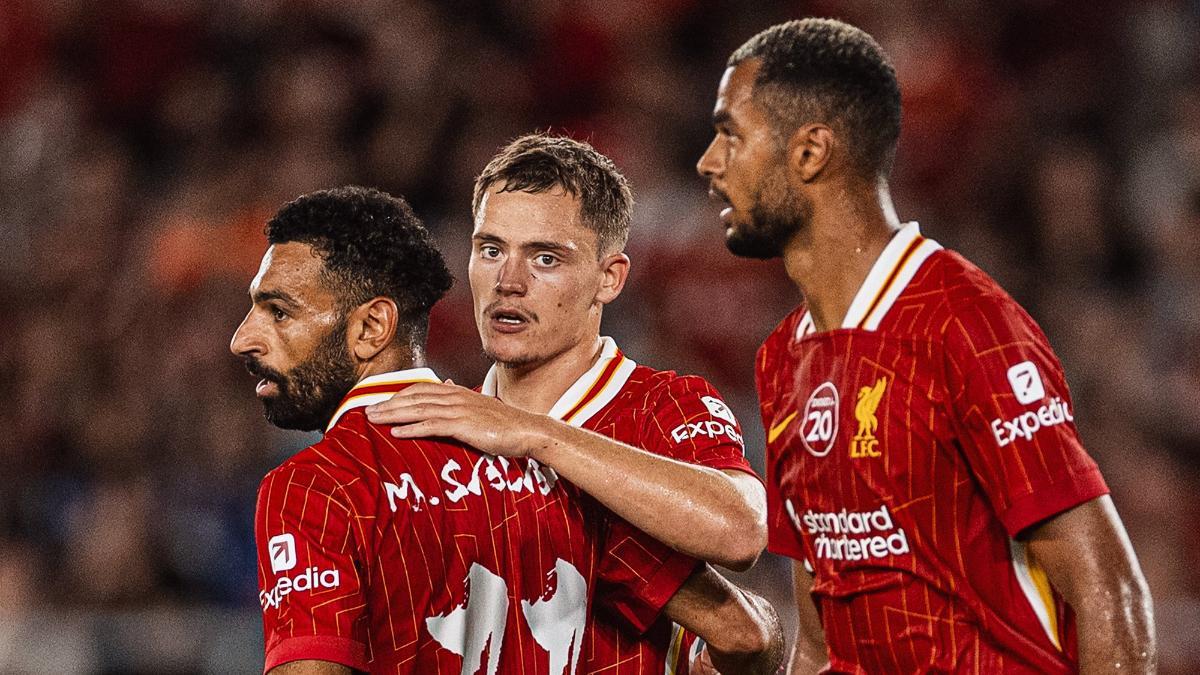 Wirtz celebrando junto a Salah y Gakpo