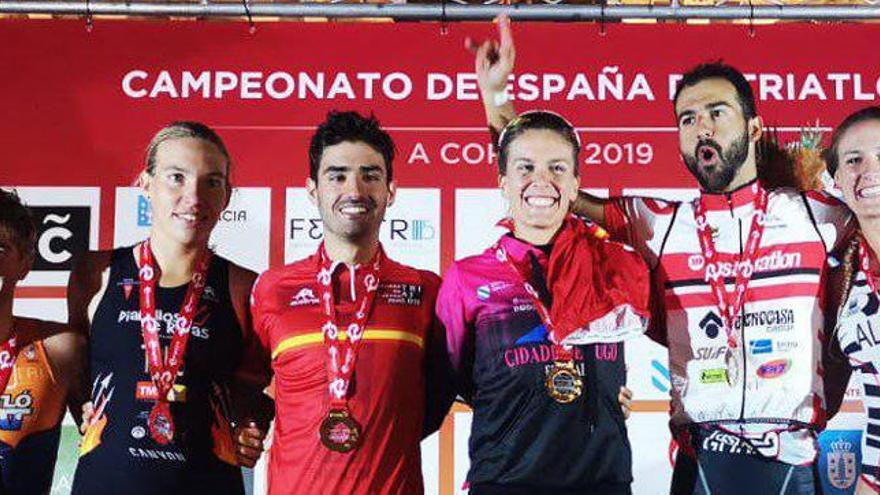 Javier Lluch y Tamara Gómez, en el centro del podio del campeonato de España