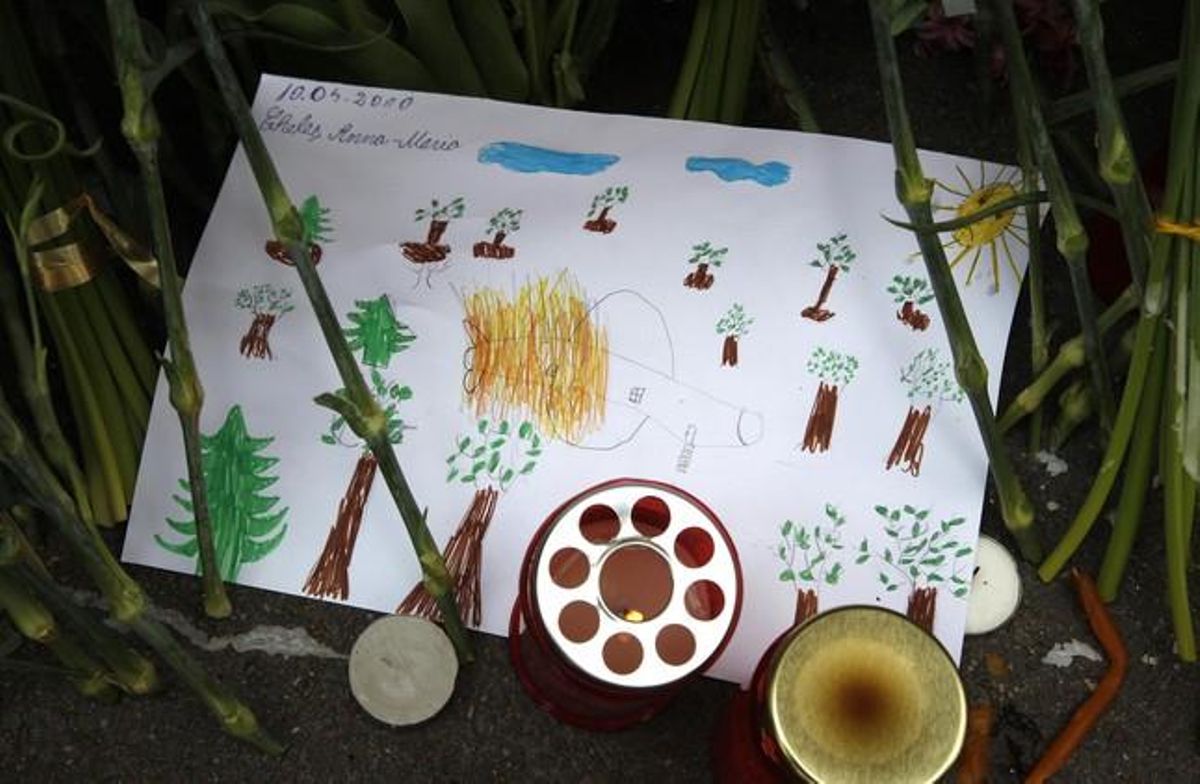 A drawing made by a child representing the Polish government Tupolev El teu-154 aircraft crac, is seen in front of the Polish Embassy in Bucharest