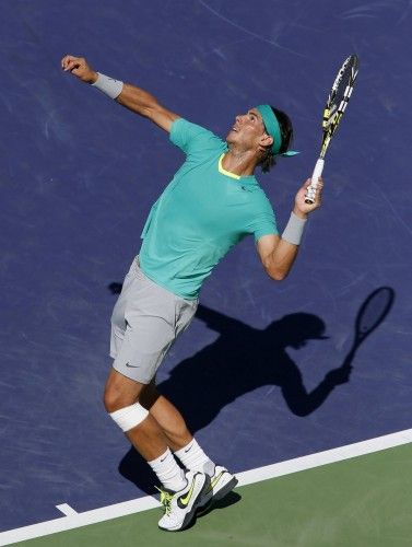 Nadal serves to Del Potro during their ATP men's singles tennis final at the BNP Paribas tournament in Indian Wells