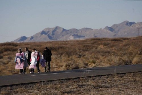 Friends and family members of missing women march during the "Walk of Justice" on the highway, on the outskirts of Ciudad Juarez