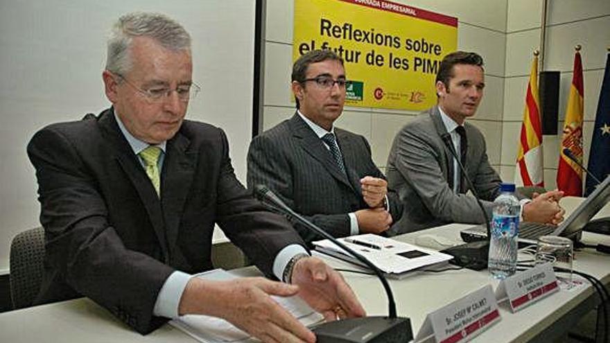 Josep Maria Calmet Iglesias en un acte amb Diego Torres i Iñaki Urdangarin a la Cambra de Comerç de Manresa el 2006