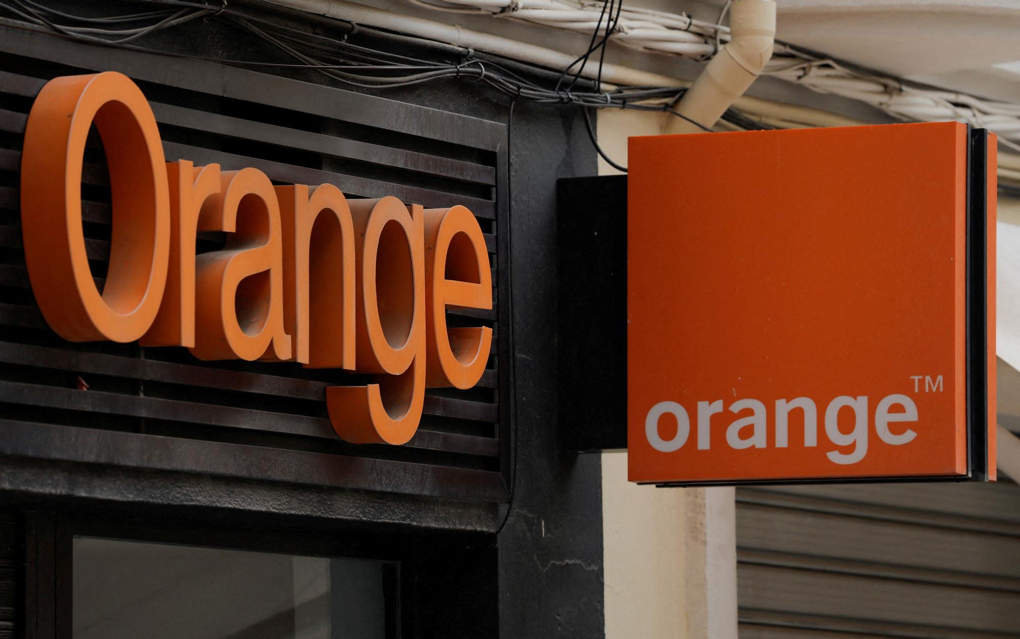 FILE PHOTO: The logo of Orange is seen on the facade of a store in Ronda