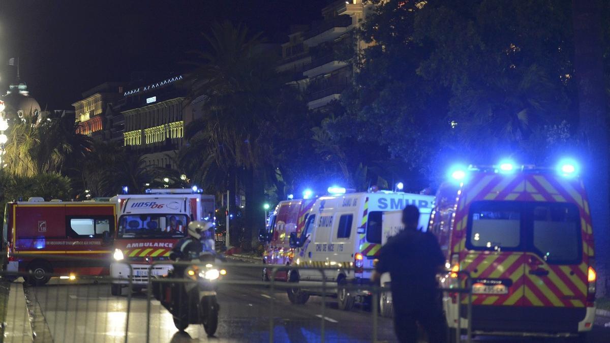 French police and rescue forces vehicles are seen on the Promenade des Anglais after at least 60 people were killed in Nice when a truck ran into a crowd celebrating the Bastille Day national holiday