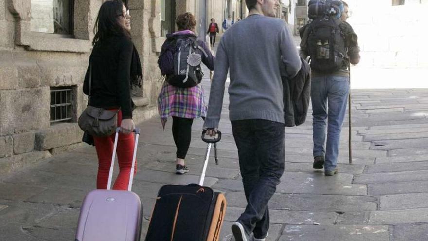 Turistas y peregrinos en Santiago de Compostela.