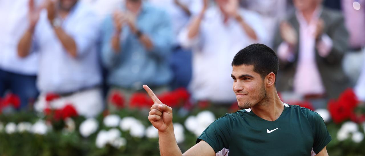 Carlos Alcaraz of Spain reacts after winning against Alexander Zverev of Germany during the Final ATP match during the Mutua Madrid Open 2022 celebrated at La Caja Magica on May 08, 2022, in Madrid, Spain.