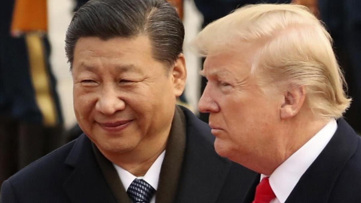 Xi Jinping y Donald Trump, en un encuentro en Pekín, el año pasado.