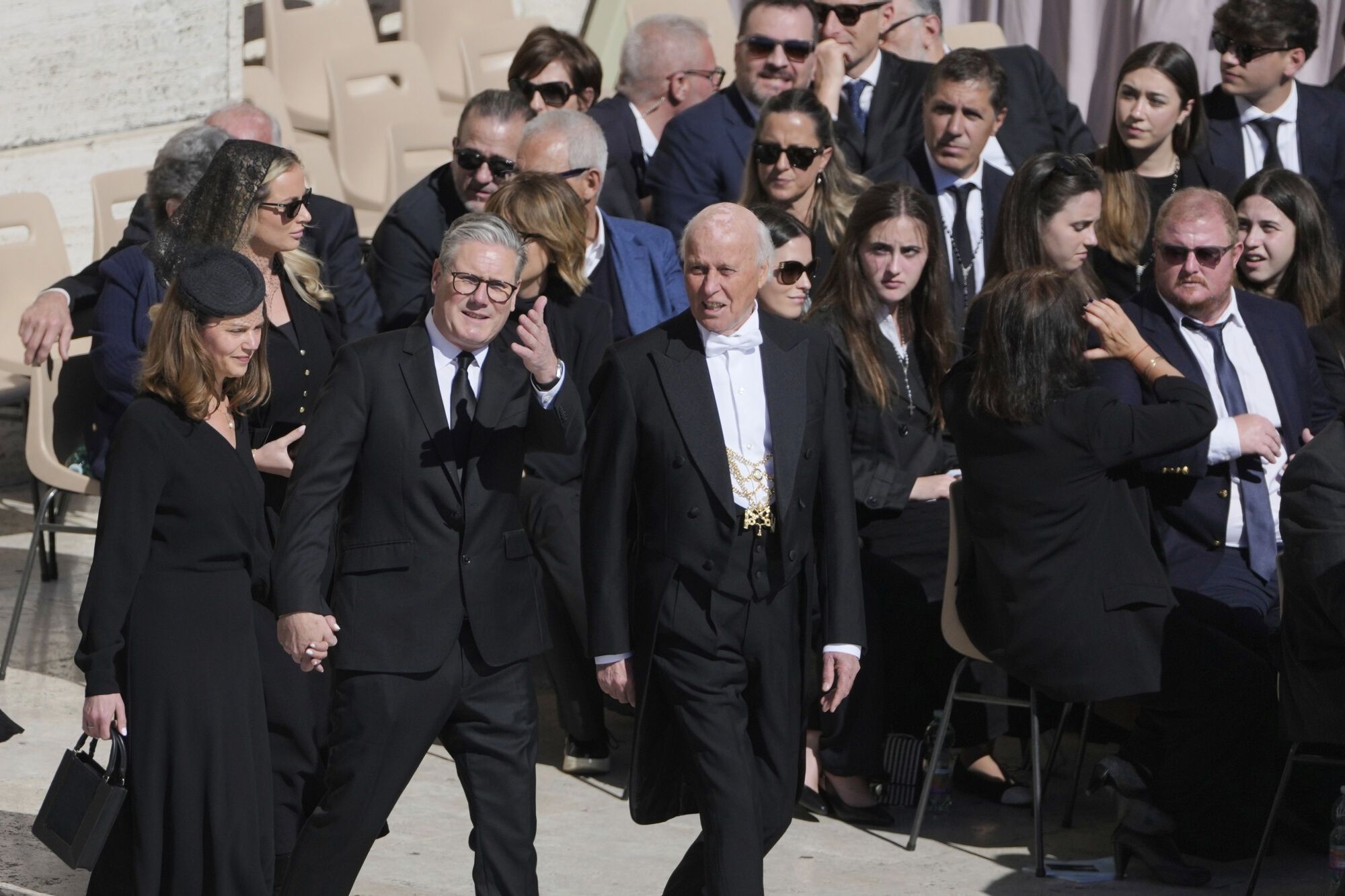 British Prime Minister Keir Starmer, center left, arrives for the funeral of Pope Francis in St. Peter's Square at the Vatican, Saturday, April 26, 2025. (AP Photo/Markus Schreiber). EDITORIAL USE ONLY/ONLY ITALY AND SPAIN