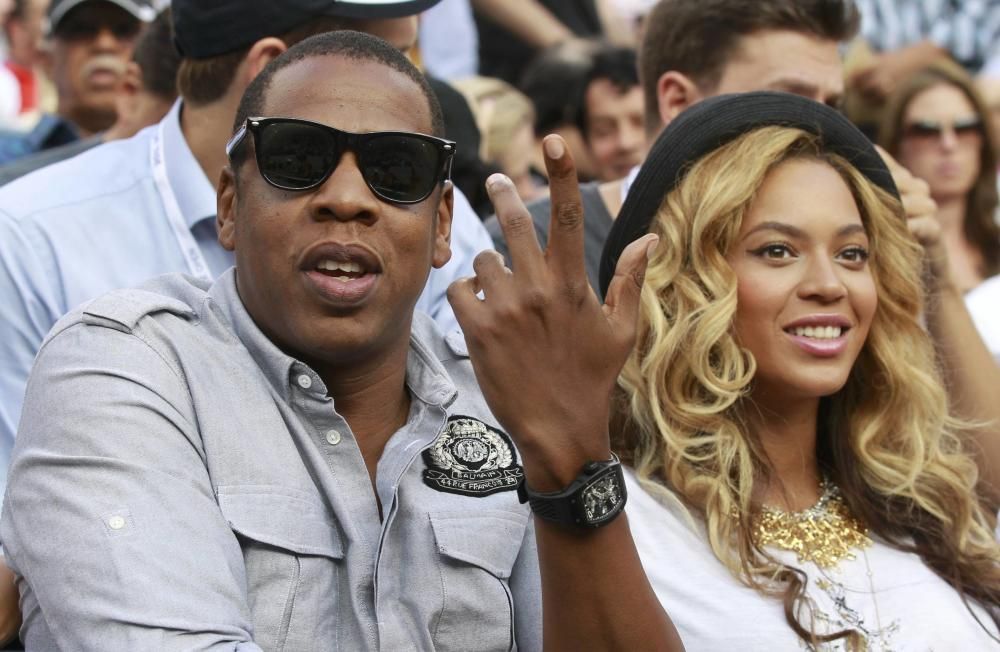 Rapper Jay-Z and his wife, singer Beyonce, ...