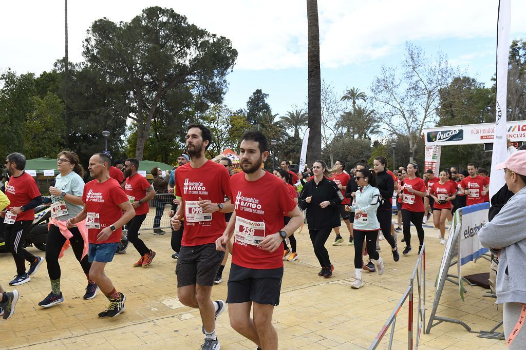 La XIII carrera solidaria Corriendo con Assido, en imágenes