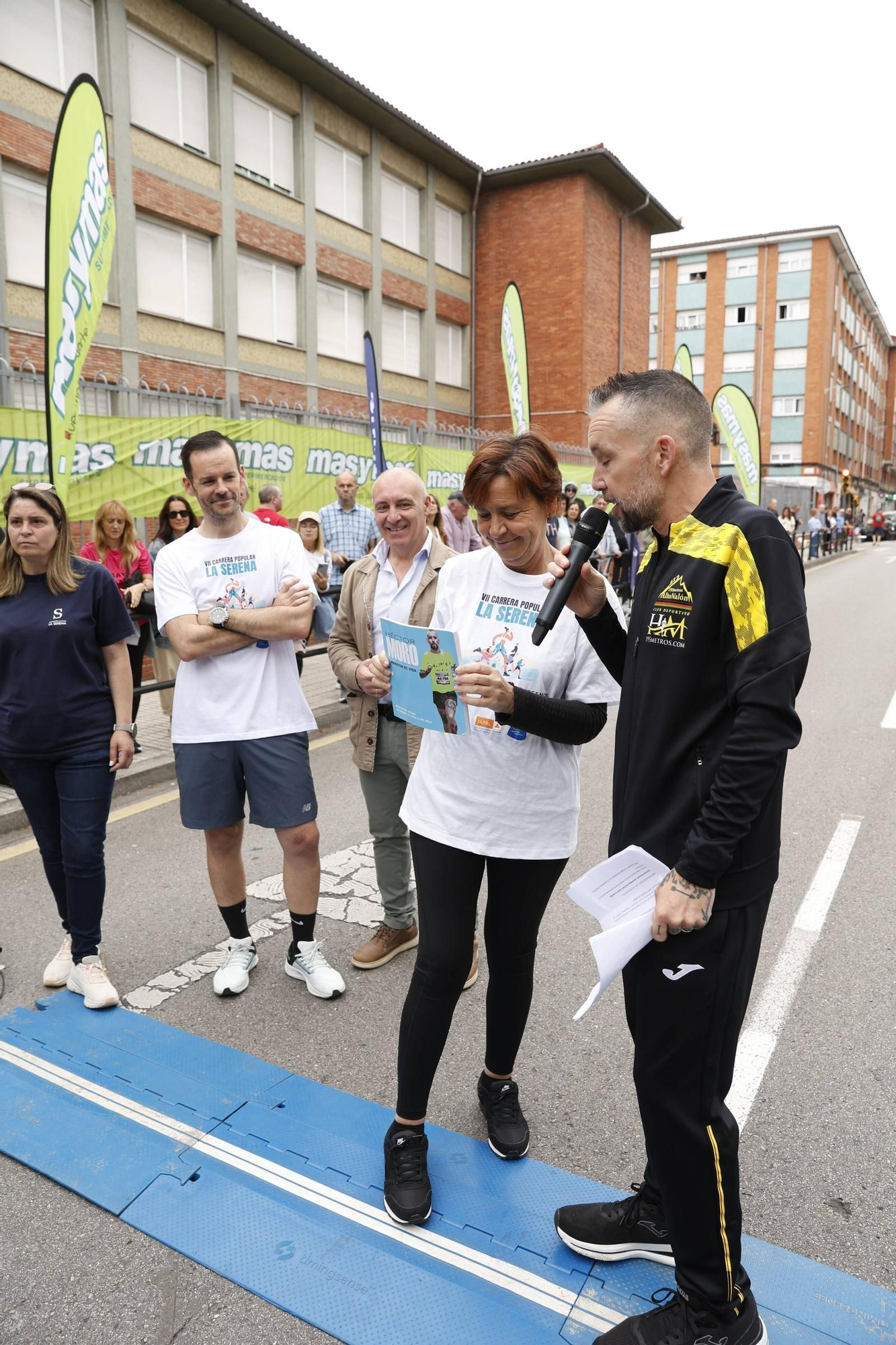 La carrera popular solidaria en El Llano, en Gijón, en imágenes