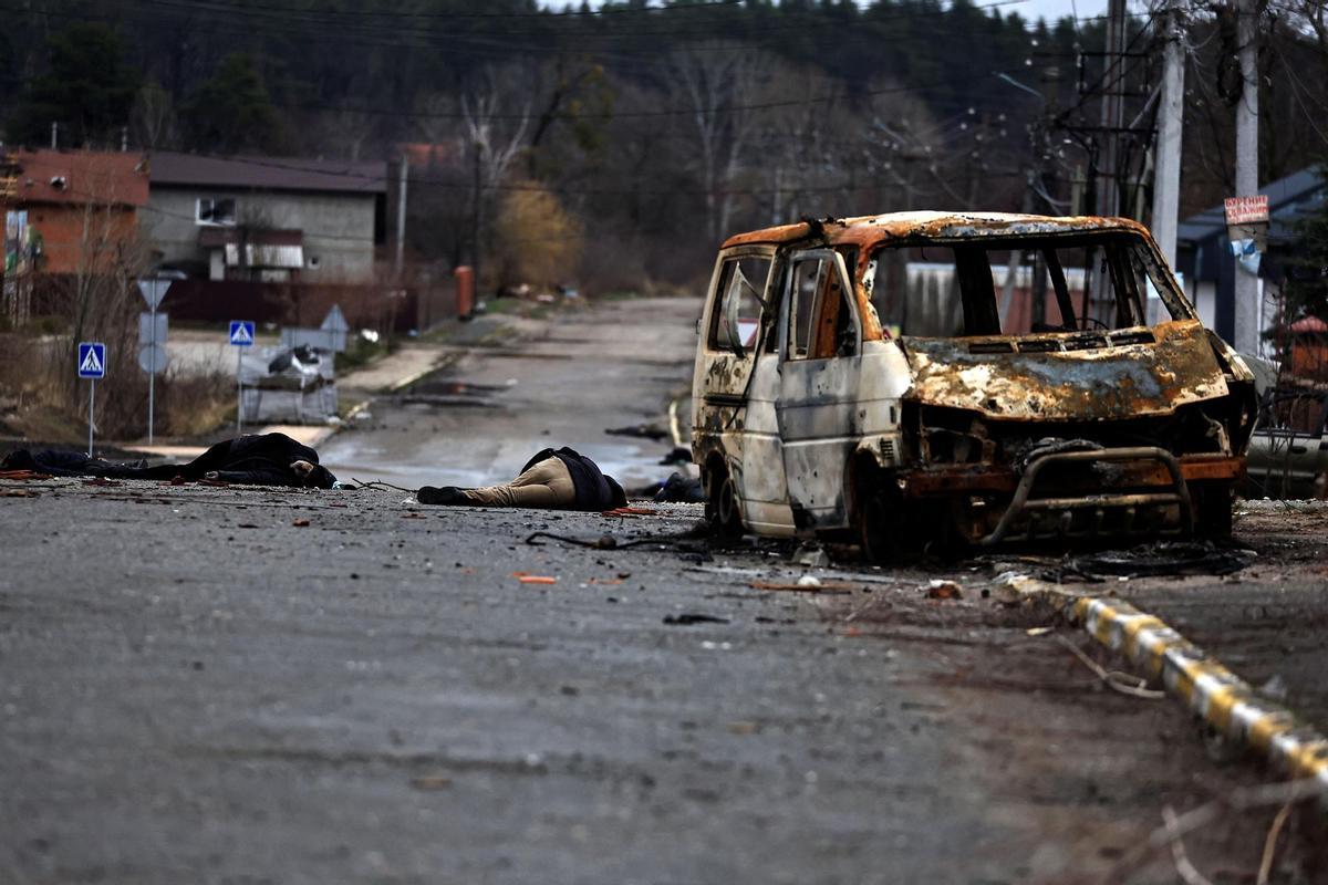 Bodies of civilians lie in the street, amid Russias invasion on Ukraine, in Bucha