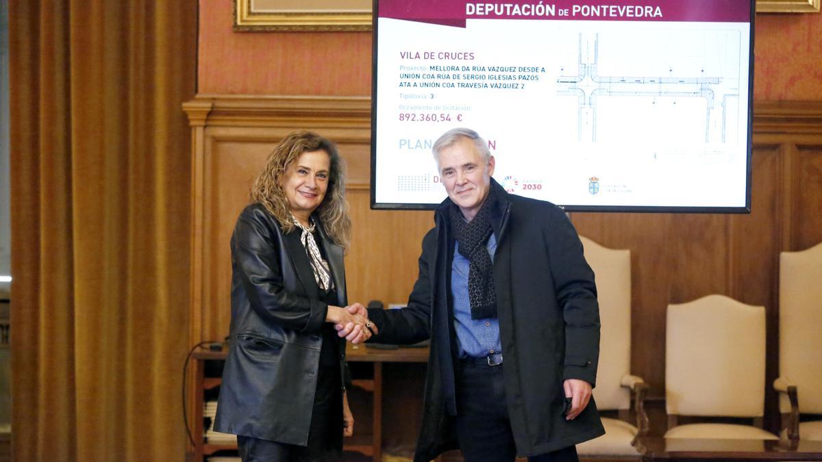 Carmela Silva y Luis Taboada, tras la firma del convenio.