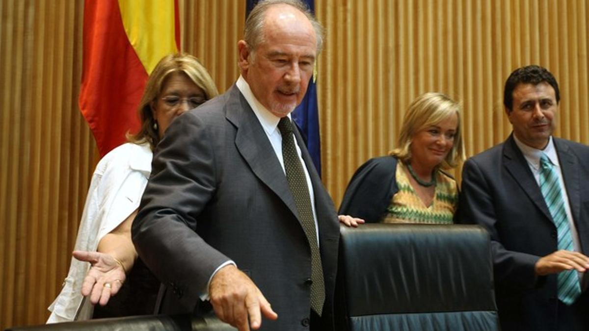 Rato llega al Congreso para dar las explicaciones de su gestión en Bankia.