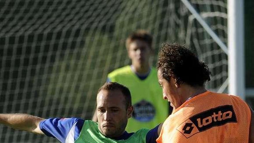 Laure y Guardado, durante un entrenamiento. / eduardo vicente