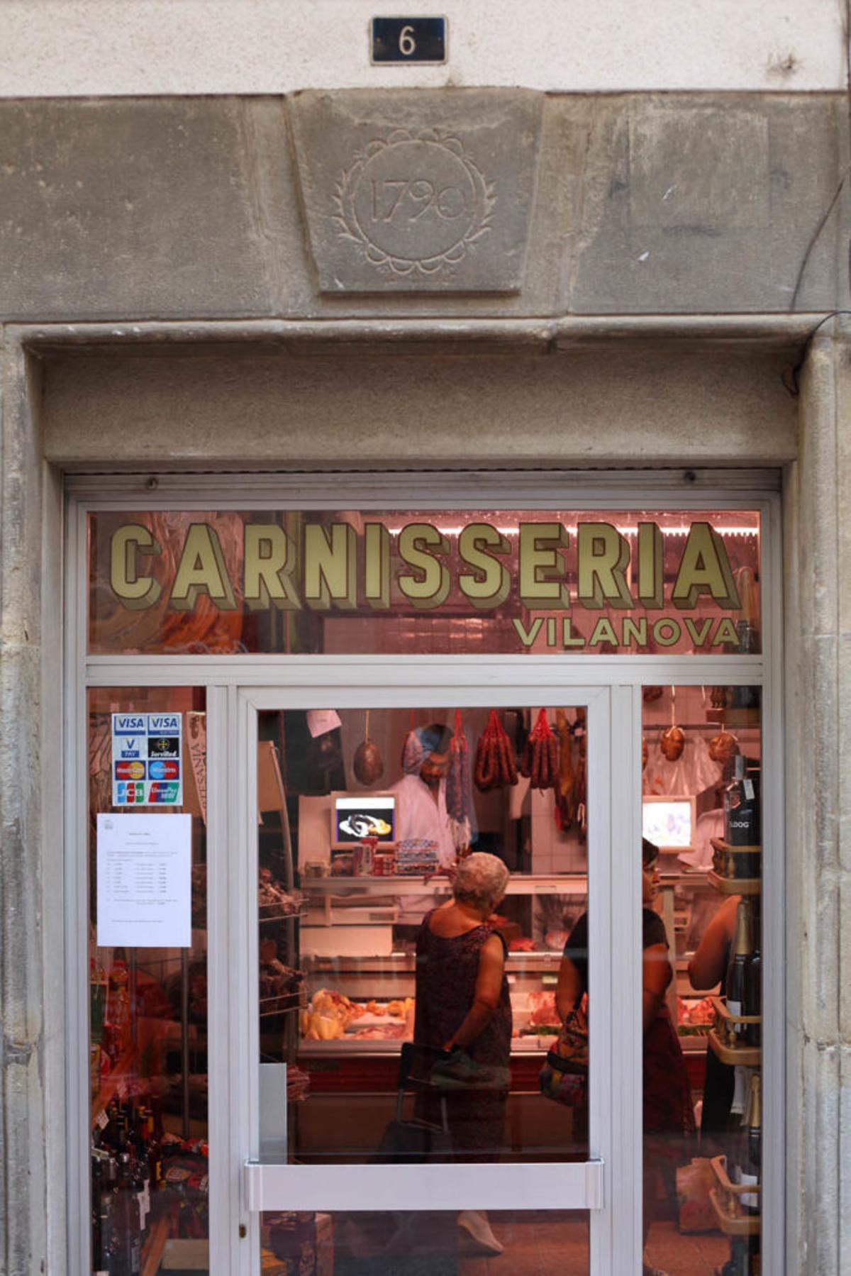 Façana dela carnisseria Embotits Vilanoca, a Tortellà.