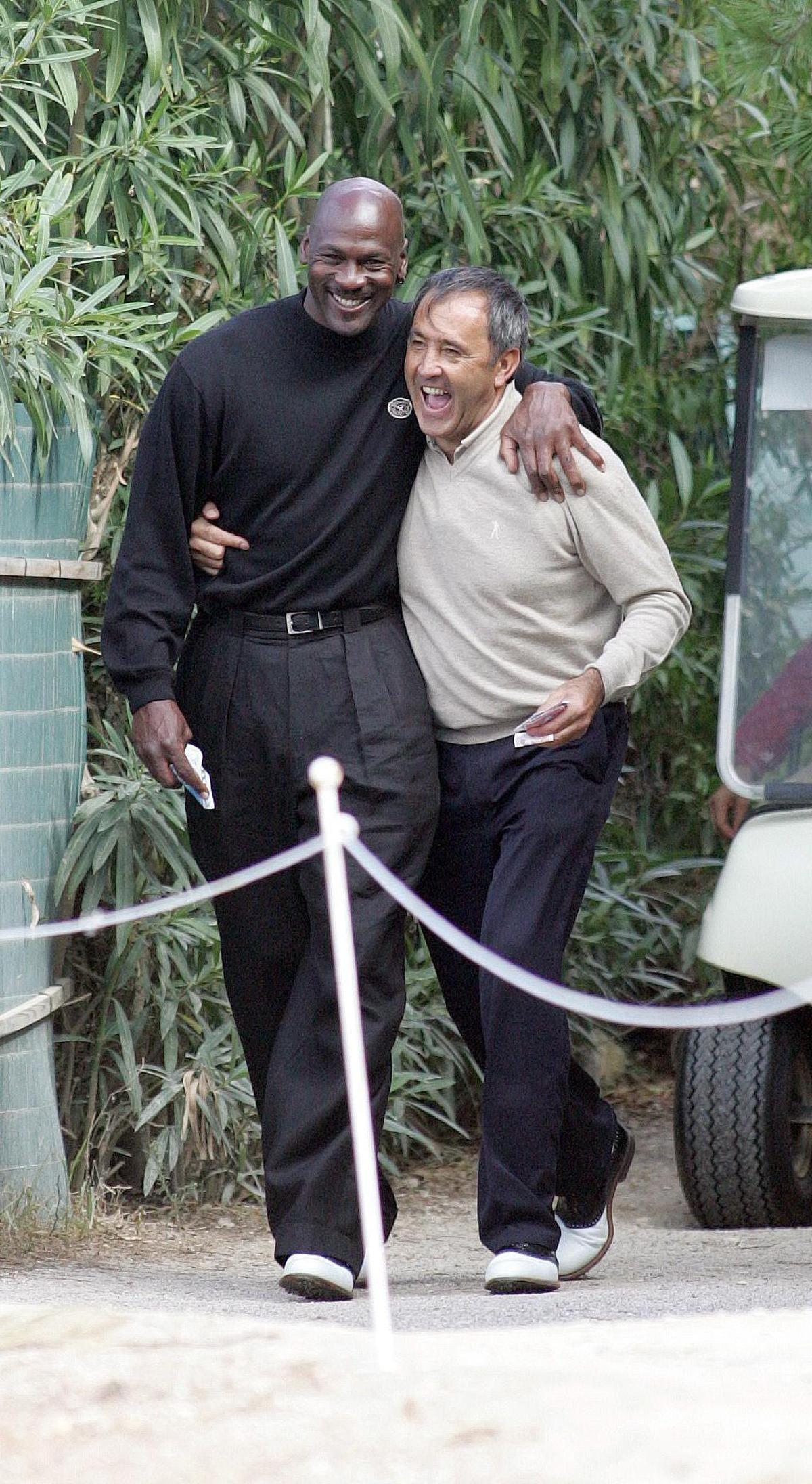Michael Jordan, con Severiano Ballesteros en el campo de golf de El Saler en 2004