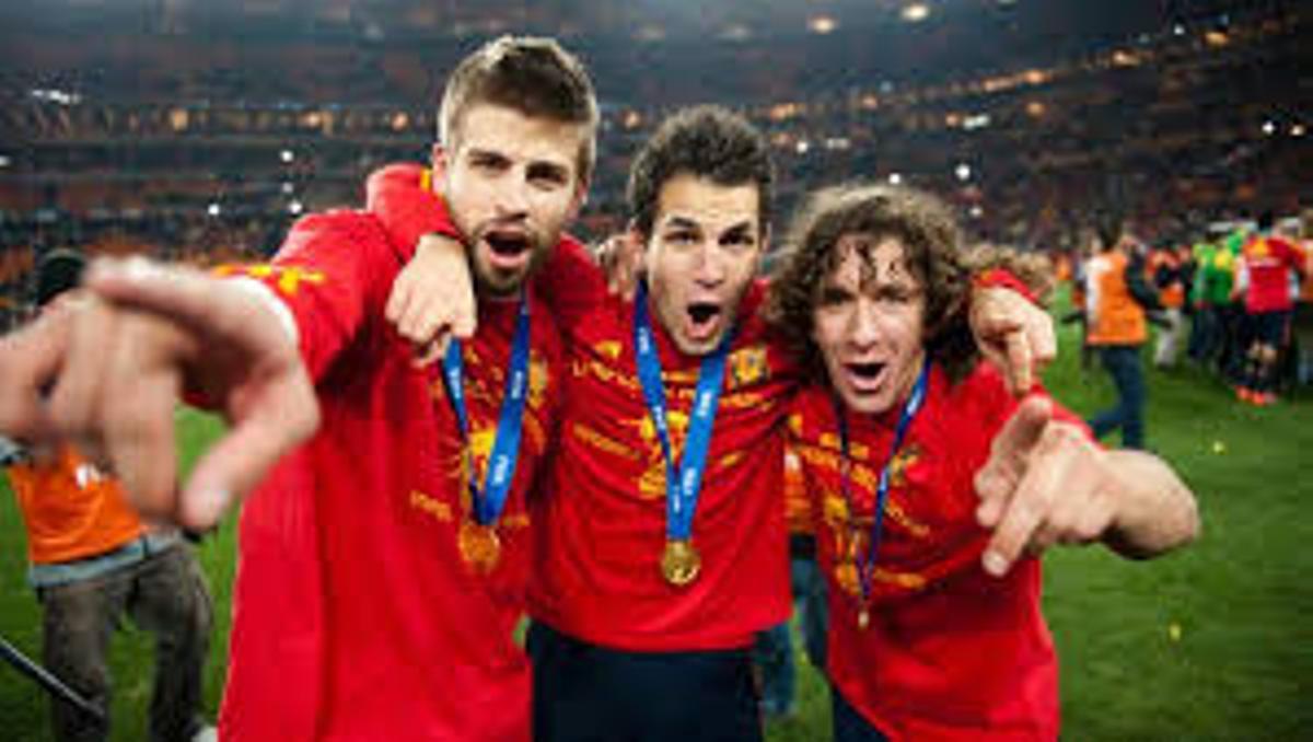 Piqué, Cesc and Puyol celebrate the World Cup in South Africa