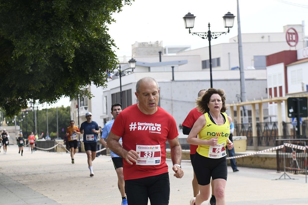 La XIII carrera solidaria Corriendo con Assido, en imágenes