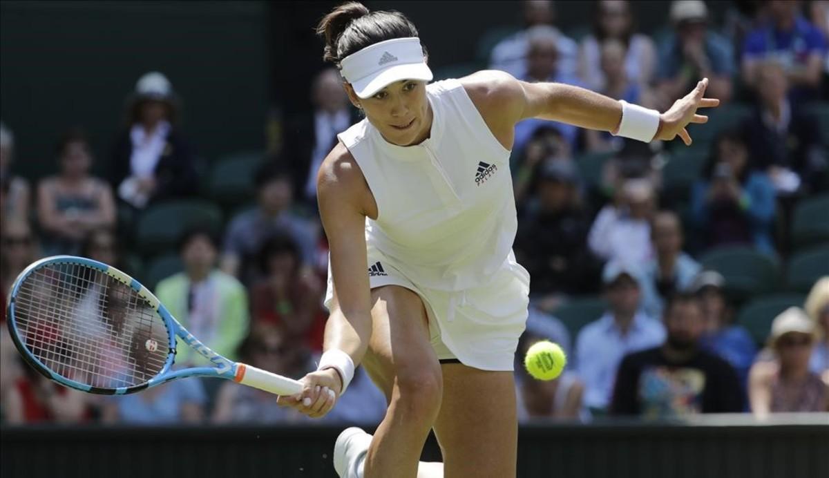 jpujol44125917 garbine muguruza of spain returns the ball to britain s naom180703144520