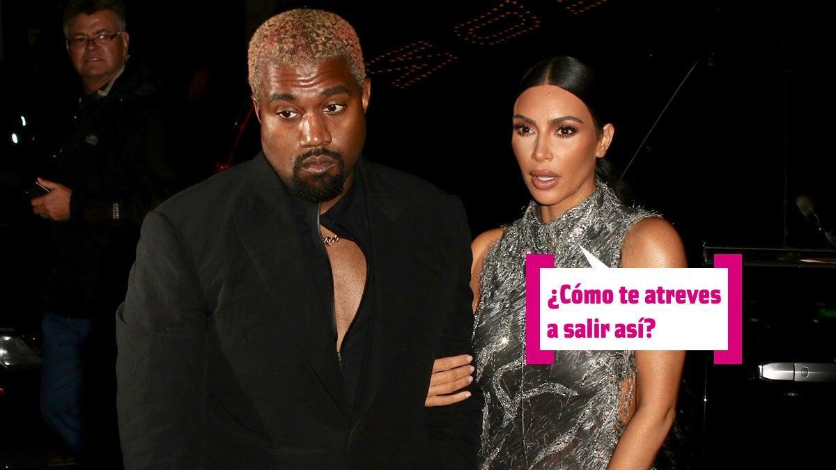 Kanye West de rubio y Kim Kardashian con vestido gris