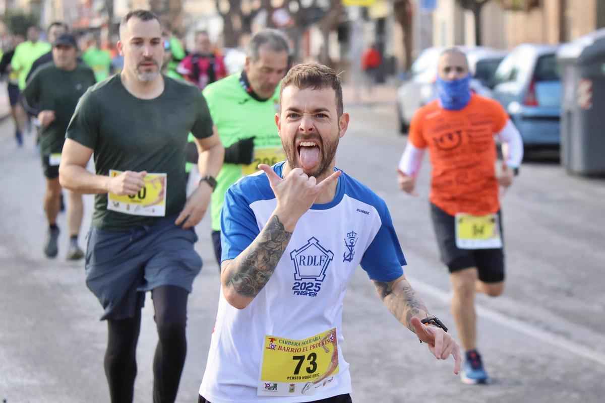 Las imágenes de la carrera popular solidaria en el barrio de El Progreso