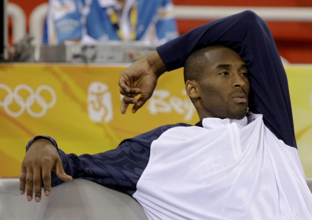 Bryant of U.S. relaxes on bench during ...