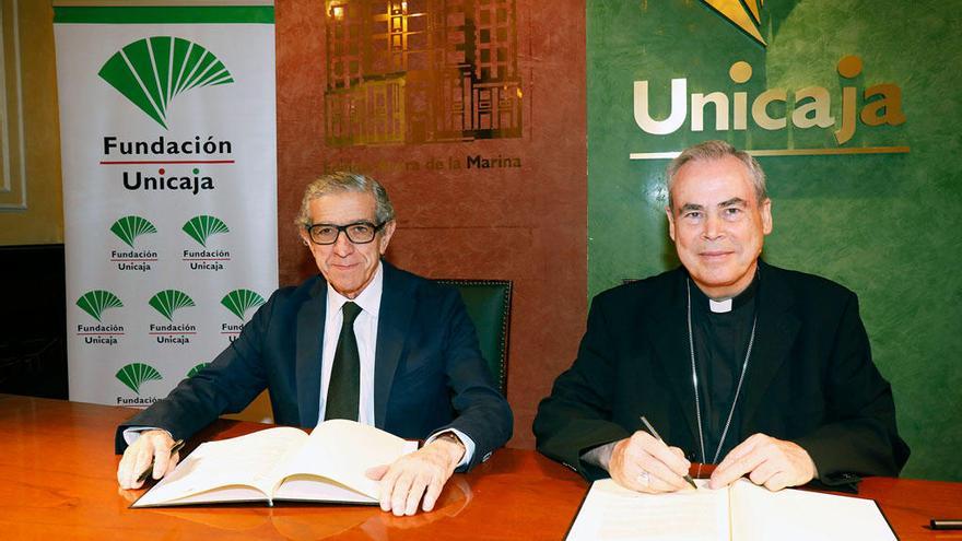 Braulio Medel y Jesús Catalá durante la firma del convenio.