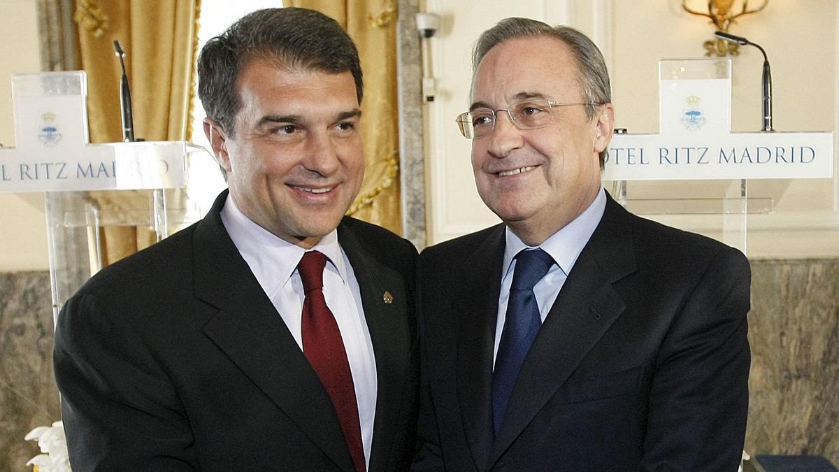 MD30. MADRID, 10/04/2010.- Los presidentes del F.C. Barcelona, Joan Laporta, y del Real Madrid, Florentino Pérez (i-d), durante su comparecencia ante los medios antes de la comida entre las juntas directivas de ambos clubes, con motivo del clásico que se diputará esta noche en el estadio Santiago Bernabeu. EFE/Joan Laporta