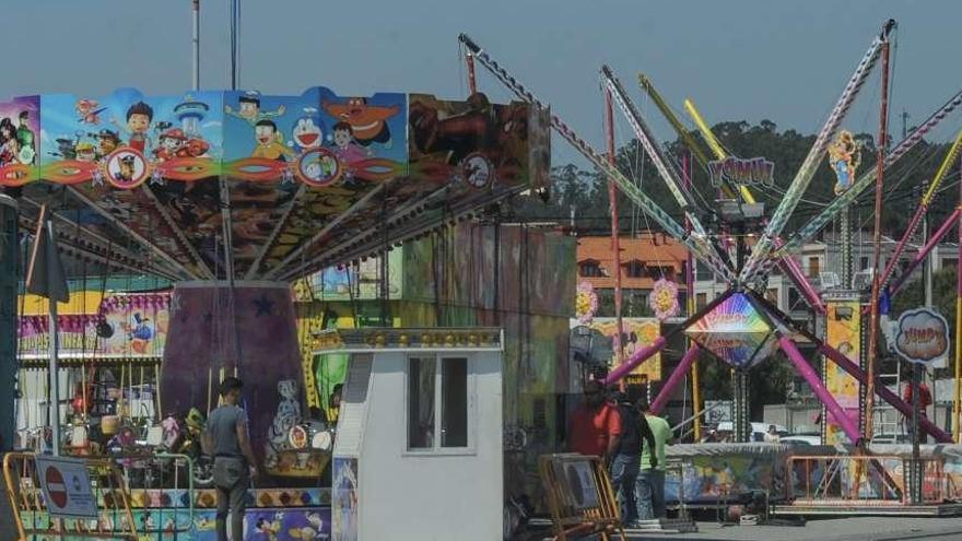 Las atracciones de feria de las fiestas de Santa Rita.  // Iñaki Abella