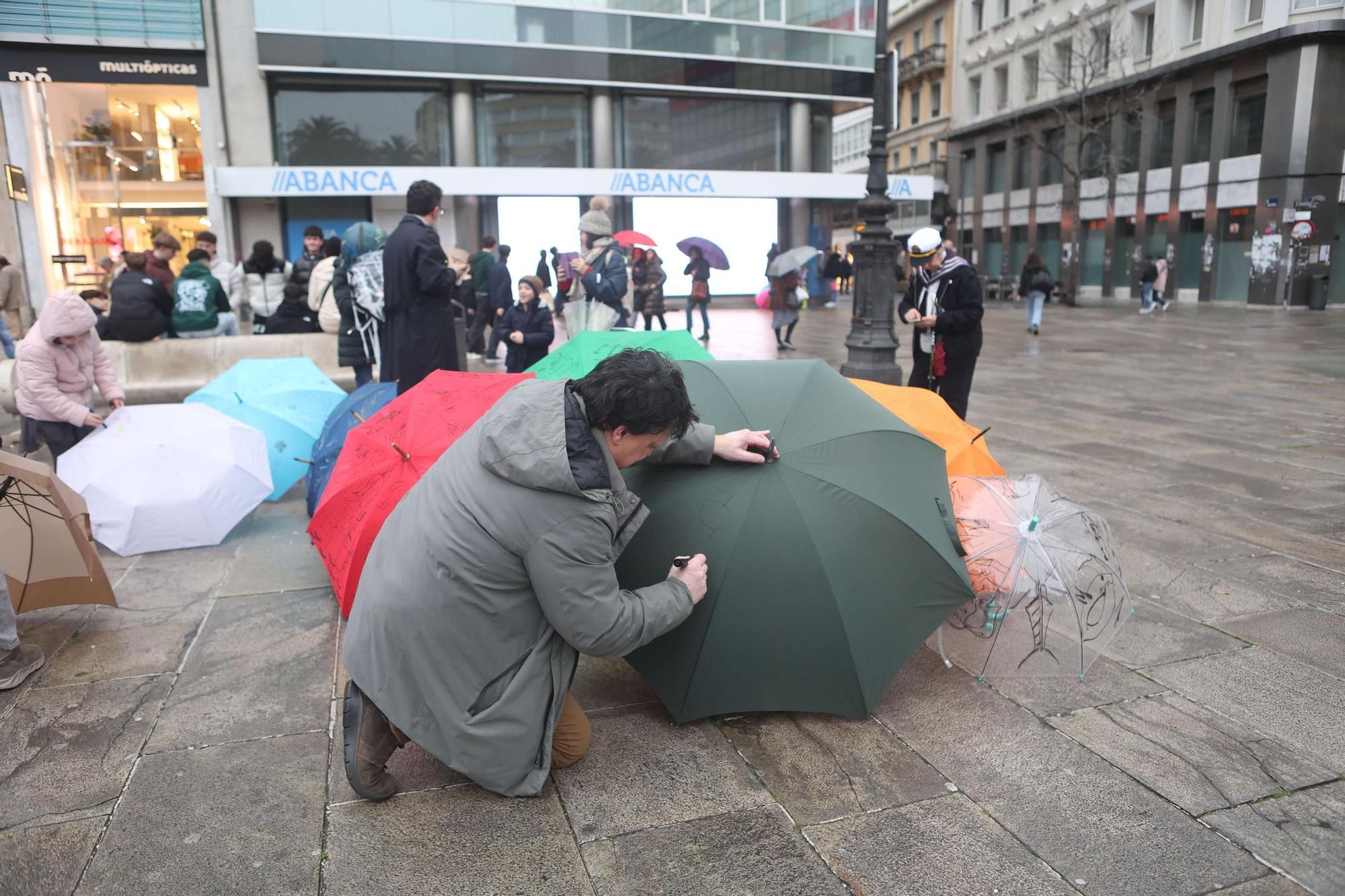 Pintada de paraguas en honor a Urbano Lugrís