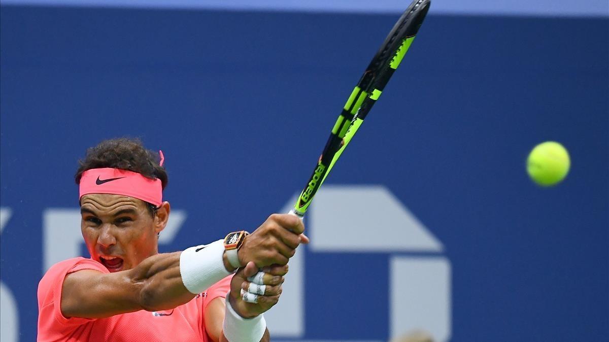 rpaniagua39859502 spain s rafael nadal returns the ball to serbia s dusan lajo170829224032