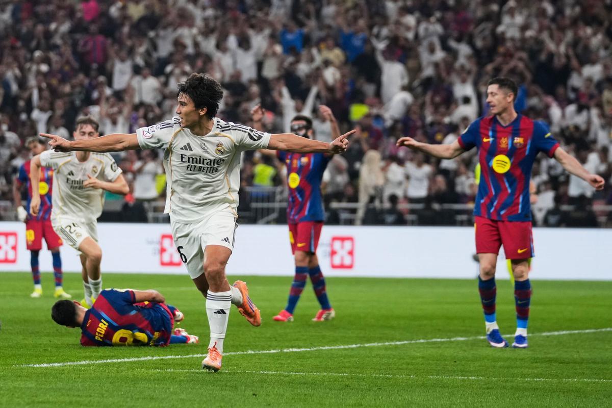 Real Madrid's Gonzalo Garcia celebrates after scoring against FC Barcelona during the Spanish Super Cup final soccer match at King Abdullah Sports City Stadium in Jeddah, Saudi Arabia, Sunday, Jan. 11, 2026. (AP Photo/Altaf Qadri). Editorial use only / Only Italy and Spain