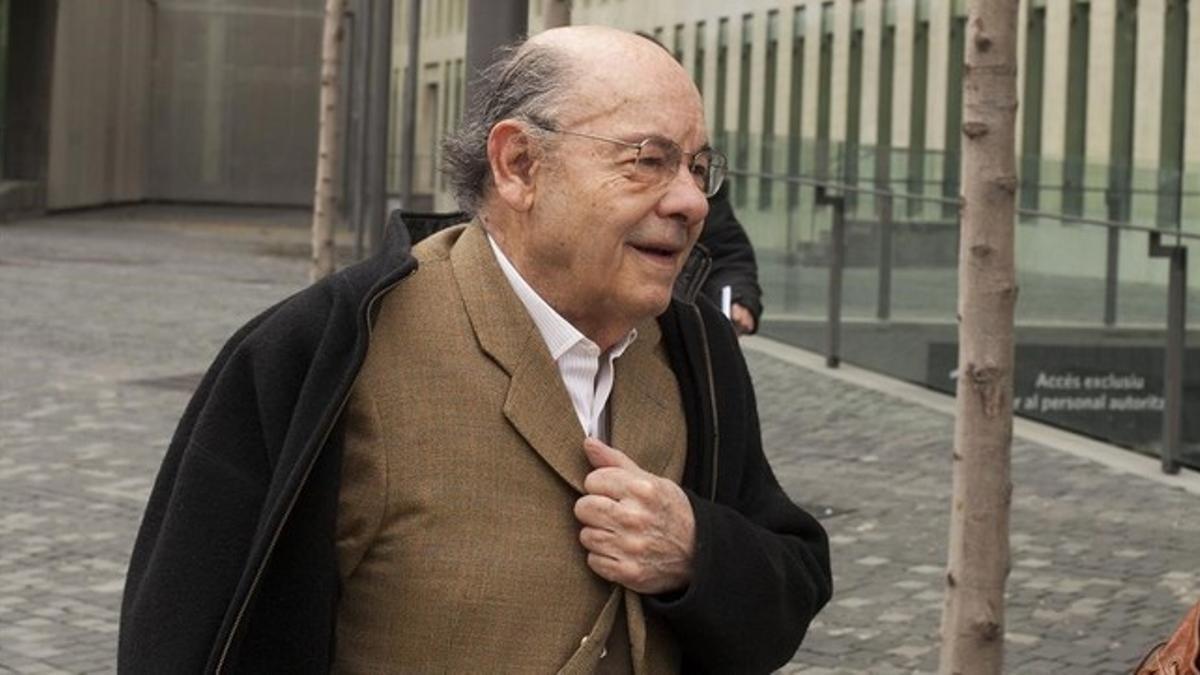 Félix Millet saliendo de la Ciutat de la Justicia, en marzo del 2013.