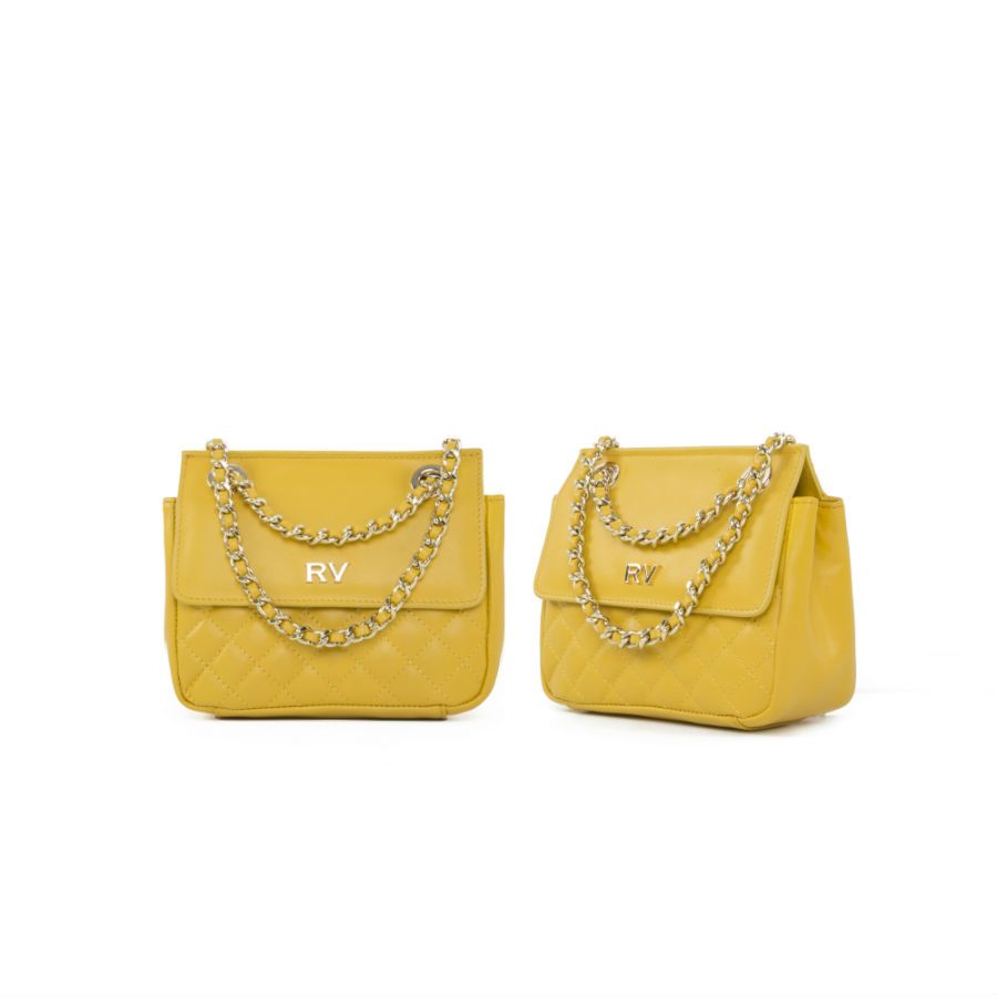 Prendas y complementos en amarillo:  bolsos de RobertoVerino