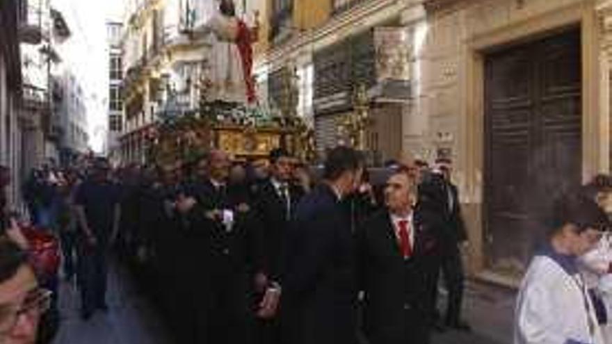 El Señor de la Cena, durante su traslado al altar.