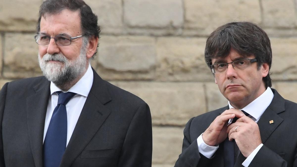 Mariano Rajoy y Carles Puigdemont