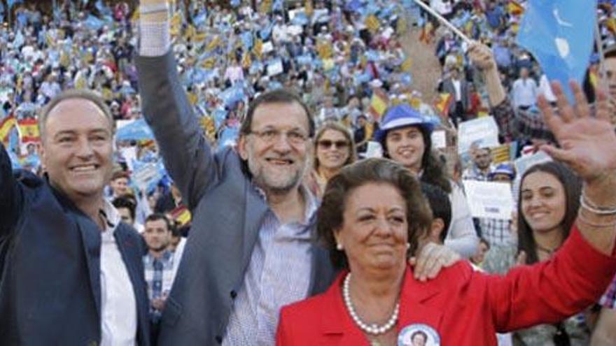 Rajoy, junto a Fabra y Barberá, en la plaza de toros de Valencia