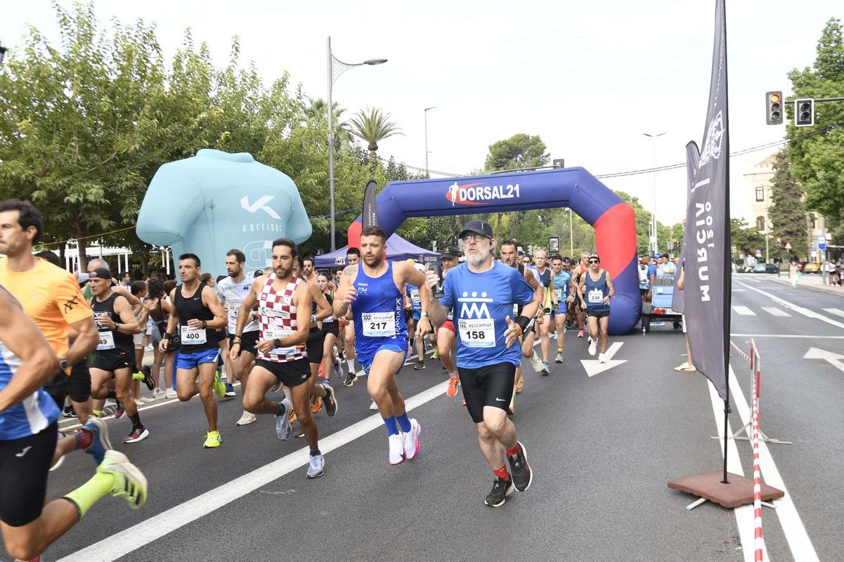 La carrera y marcha Solidaria Asteamur, en imágenes