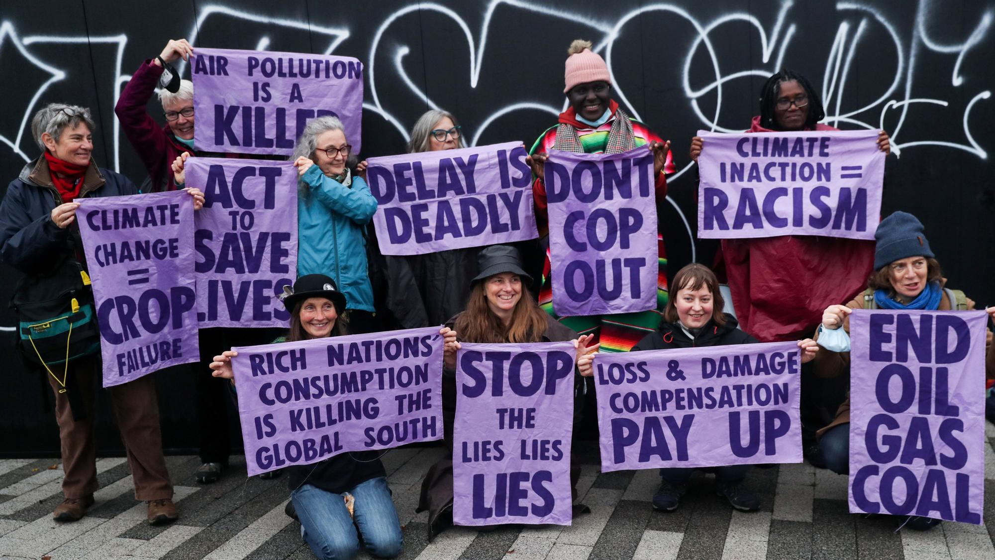 Activists take part in a protest during the UN Climate Change Conference (COP26), in Glasgow, Scotland, Britain, November 8, 2021. REUTERS/Russell Cheyne