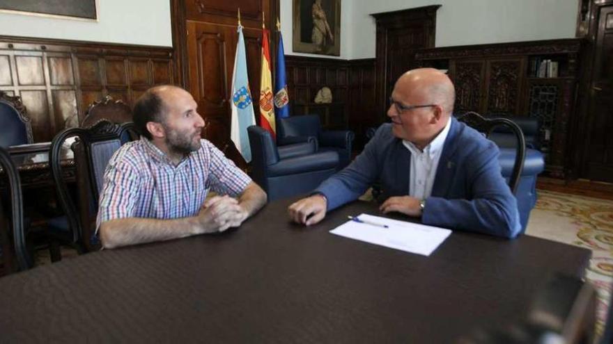 El líder de DO, Gonzalo Jácome, y el presidente de la Diputación, Manuel Baltar, en una reunión. // J. Regal