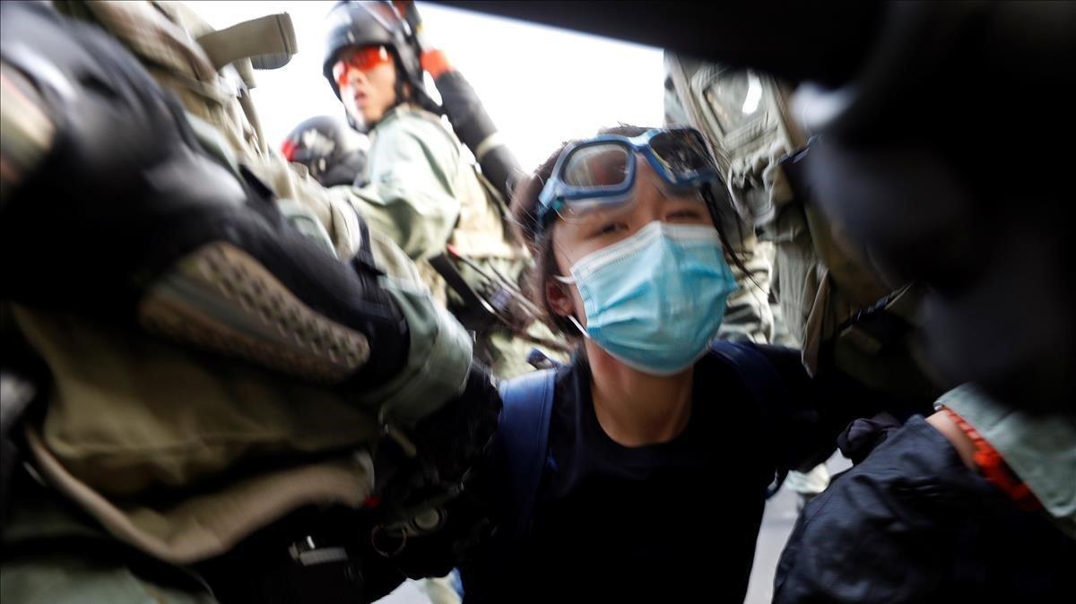 zentauroepp49990430 police officers detain an anti government protester in sha t190922181834