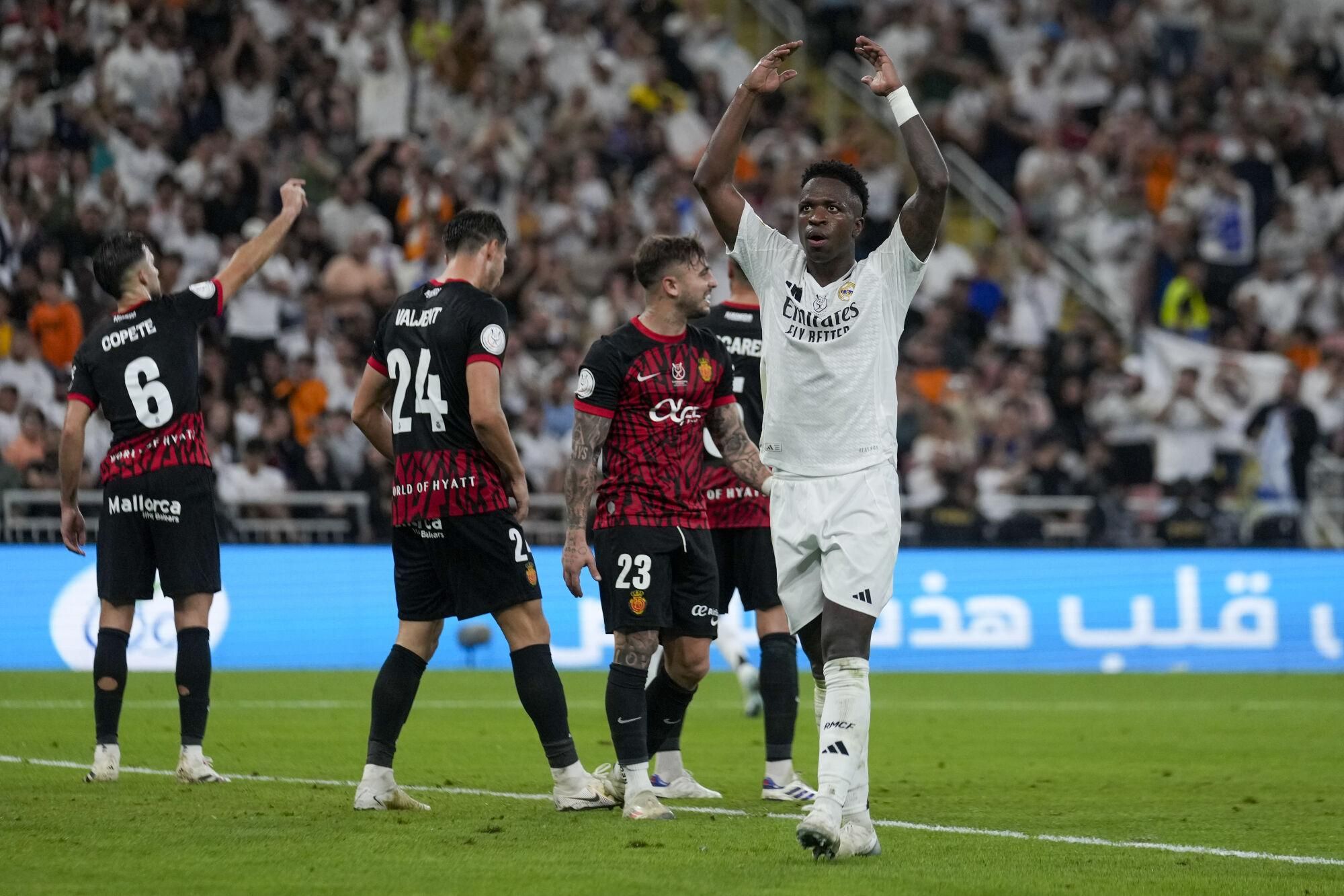 Real Madrid's Vinicius Junior reacts during the Spanish Super Cup semifinal soccer match between Real Madrid and Mallorca at the King Abdullah Stadium in Jeddah, Saudi Arabia, Thursday, Jan. 9, 2025. (AP Photo/Altaf Qadri)